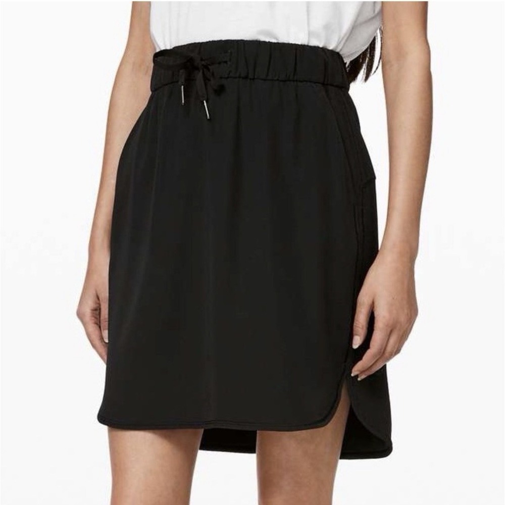 Lululemon On the Fly Skirt Womens Size 8 Black Excellent Drawstring Pockets